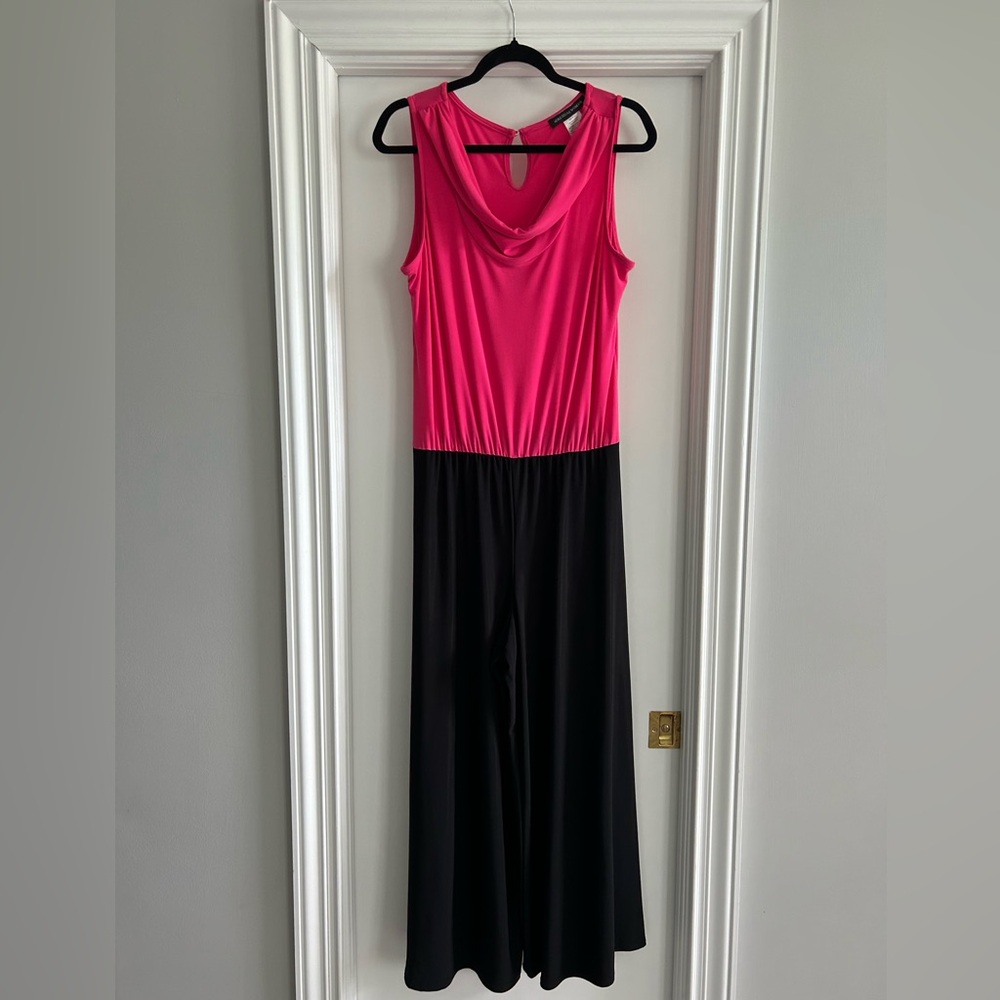Adressingwoman fuscia & black jumpsuit. Great condition. Size L.